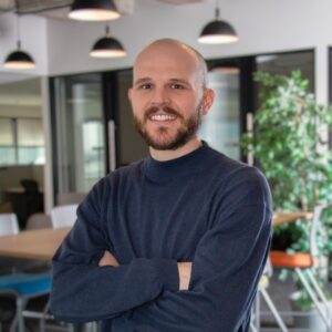 Marty Dekker, a young white data professional with a beard