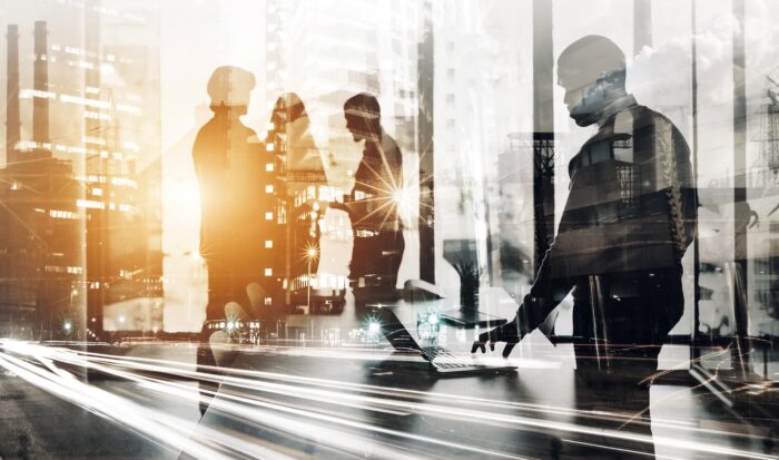Silhouette, city and double exposure with business people in office: Teamwork. Innovation, future