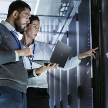 man and woman in server room
