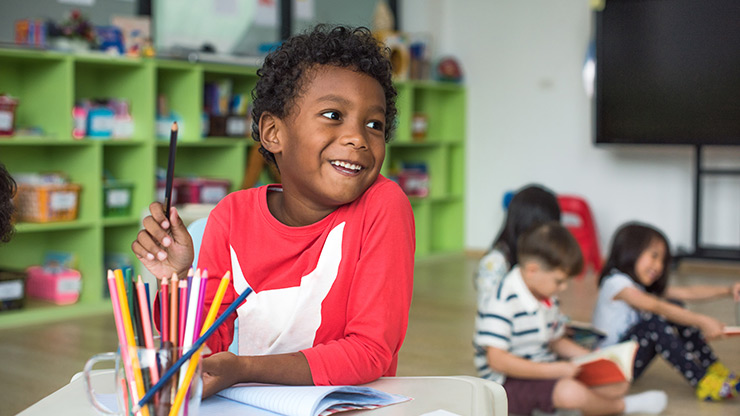 Little boy coloring
